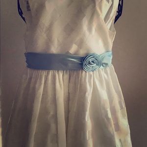 Tulle lined dress, with light blue attached belt.